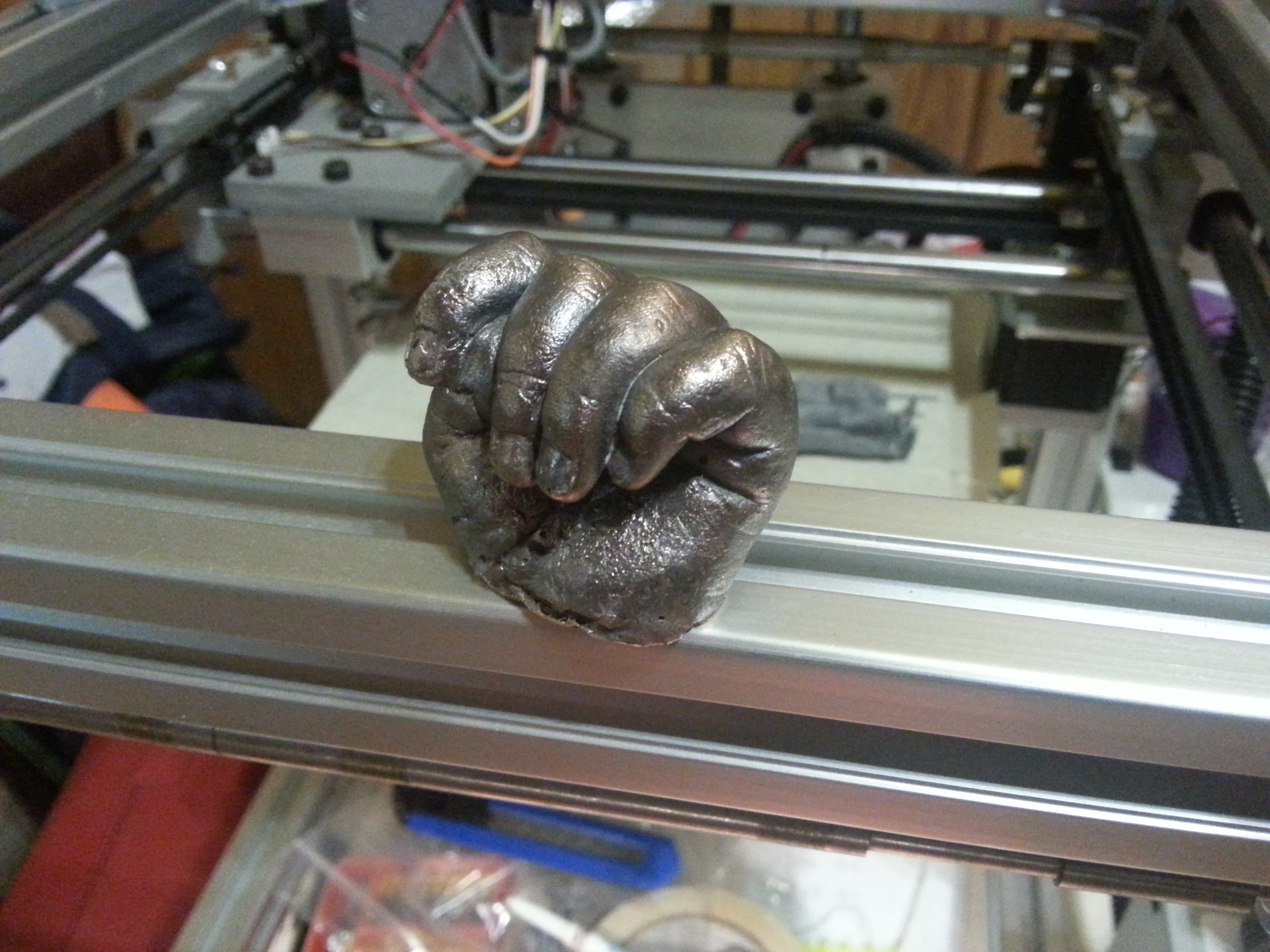 My Daughters hand in bronze at 1 month old.